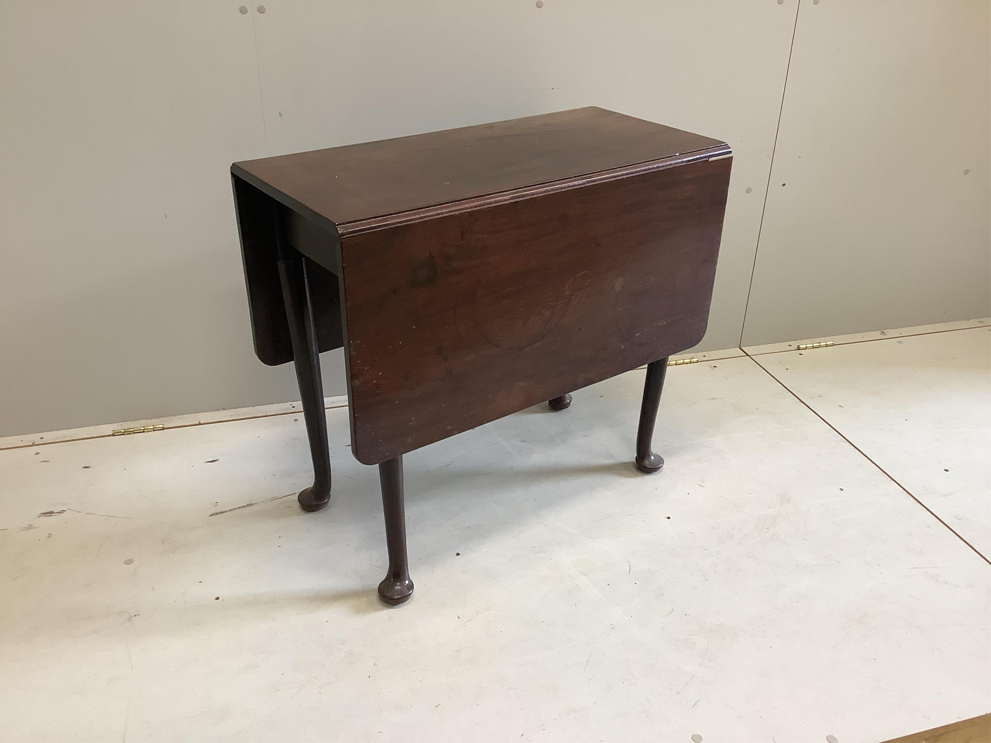 A George III mahogany drop leaf pad foot dining table, width 78cm, depth 40cm, height 71cm. Condition - fair